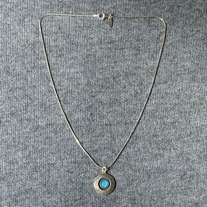 Sterling silver 925 necklace with round pendant with blue stone middle